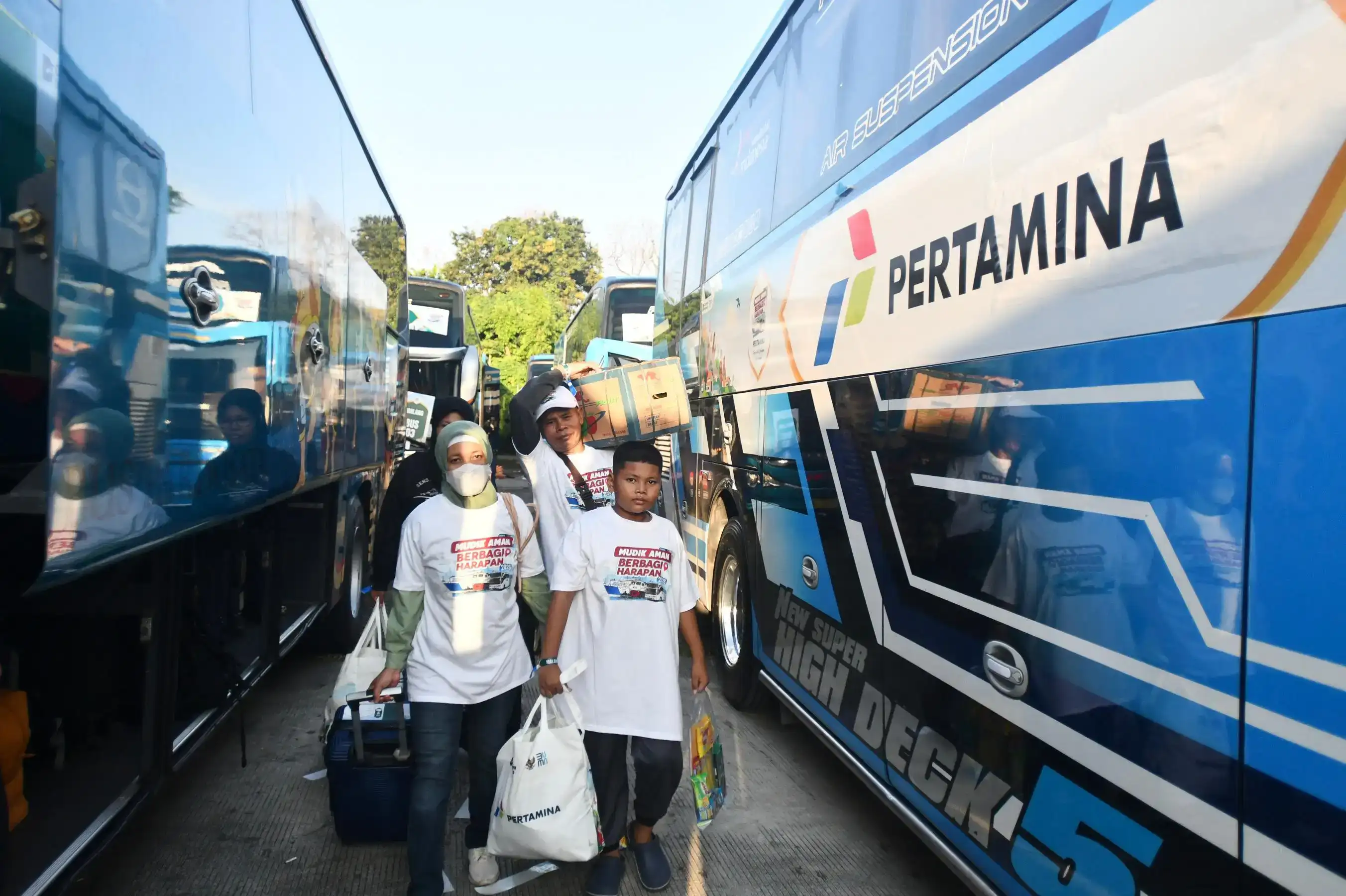 Ilustrasi program Mudik Bersama Pertamina 2026 yang memberangkatkan lebih dari 5.000 pemudik ke 23 kota di Pulau Jawa
